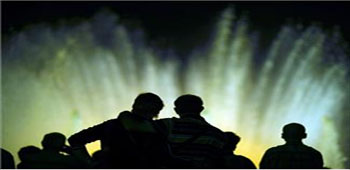 Silhouette of People at a Fountain